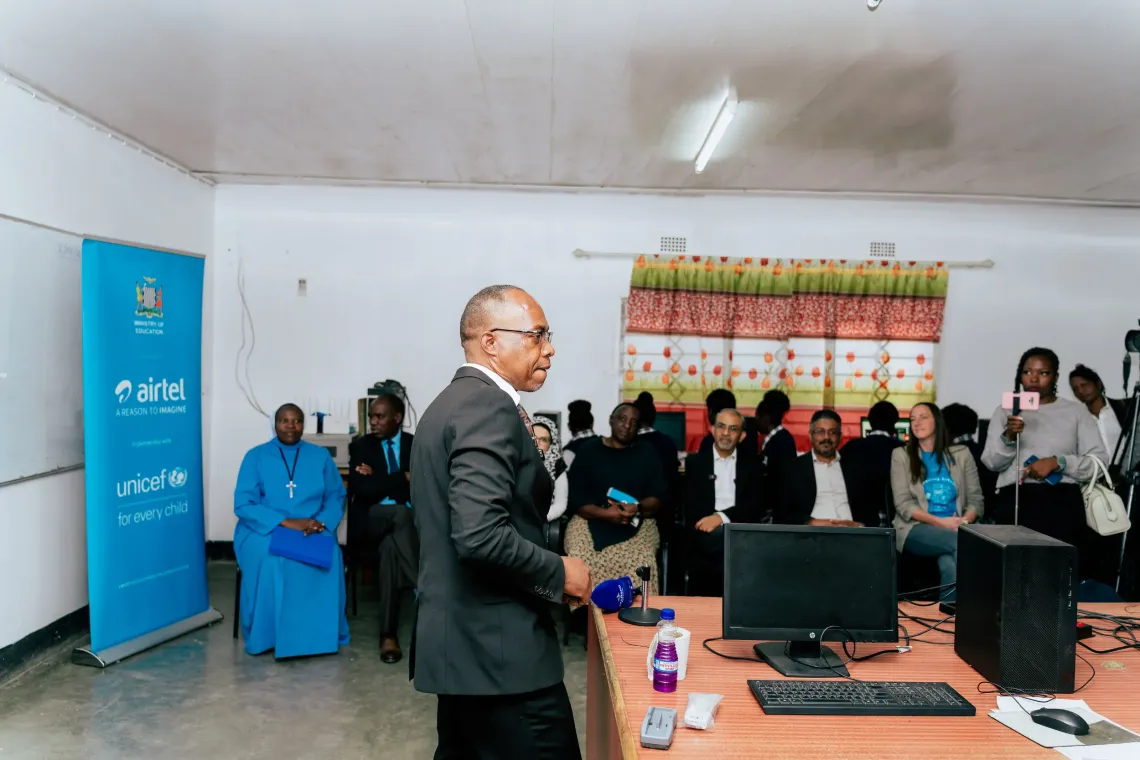 Ministry of Education Director of Secondary Education Yvonne Mweemba Chuulu observes a digital learning demonstration using the Zambia Learning Passport at St. Monica's Girls' Secondary School.