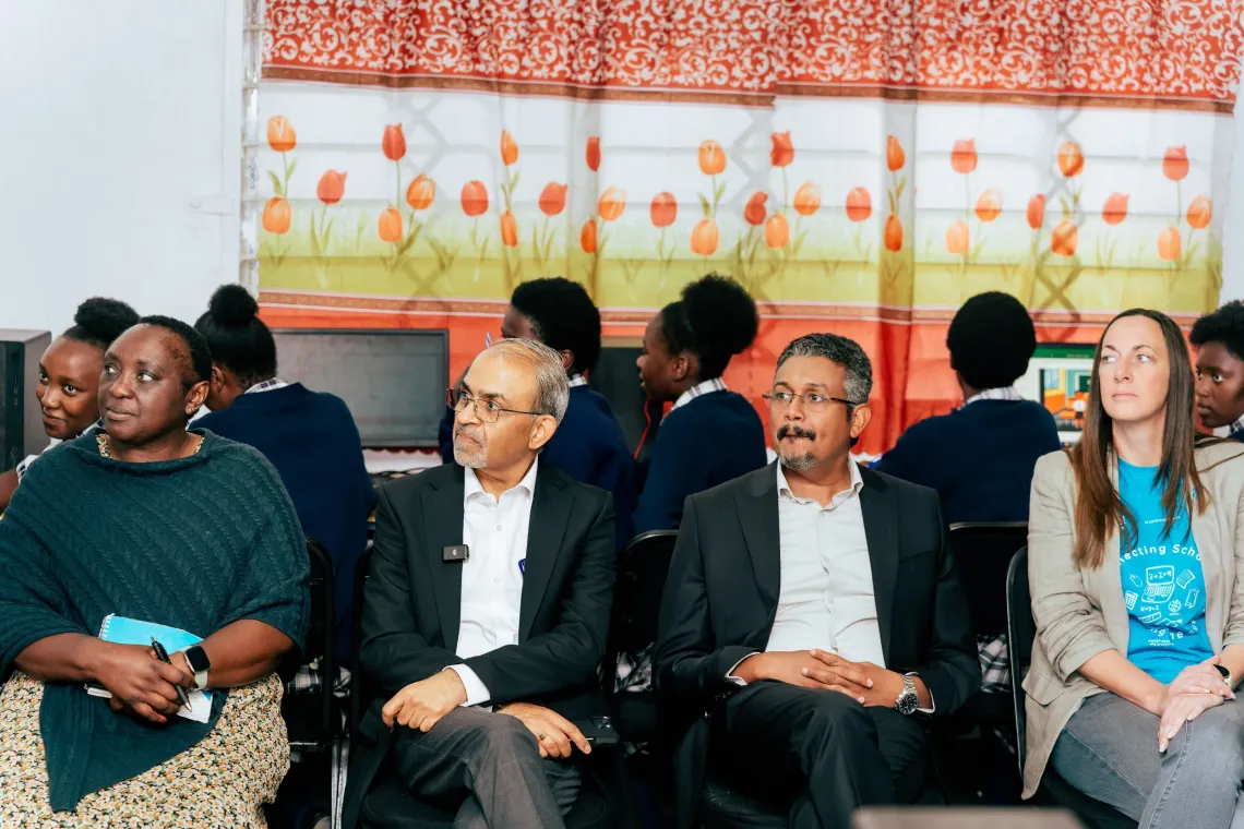 Representatives from the Ministry of Education, UNICEF and Airtel observe a digital learning demonstration while learners use the Zambia Learning Passport at St. Monica's Girls' Secondary School.