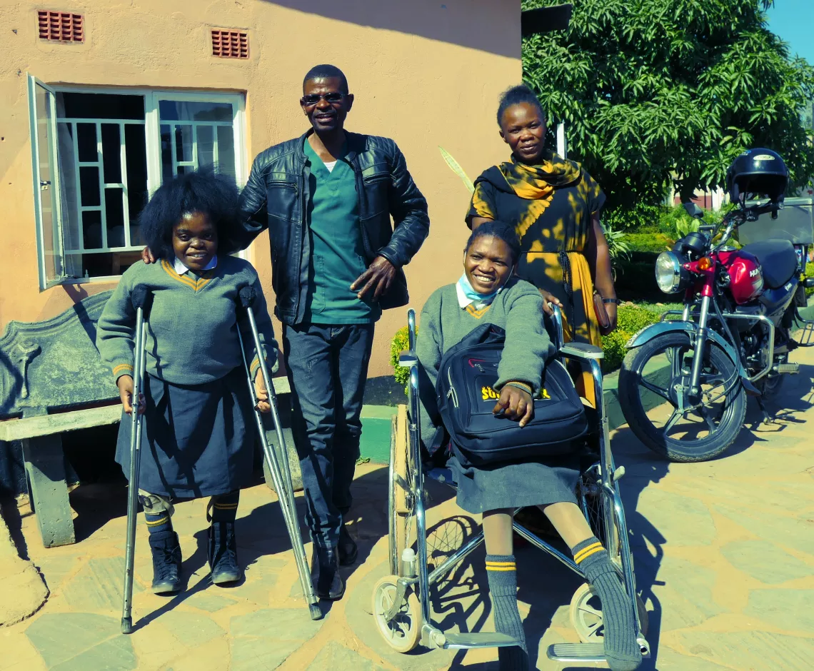 Parents and their children with disabilities, at school