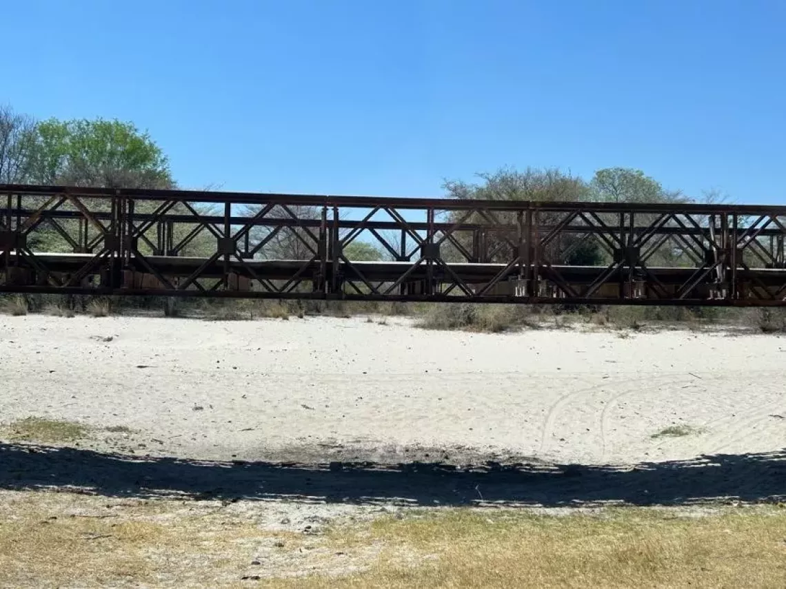This bridge along the main road to the district, spans a once-flourishing river, now completely dried up and devoid of its abundant fish.
