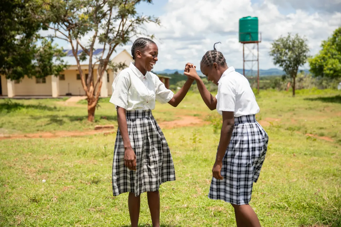 These two girls are back in the classroom, reclaiming their right to learn, grow and build a brighter future.