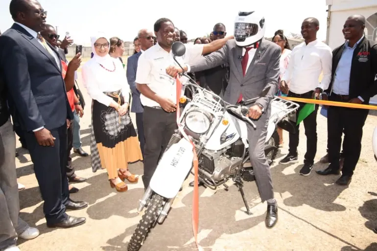 Ministry of Health Permanent Secretary &ndash; Technical Services, Dr Lishimpi, tries out one of the motorbikes during the handover ceremony, held in partnership with key stakeholders to strengthen health service delivery.