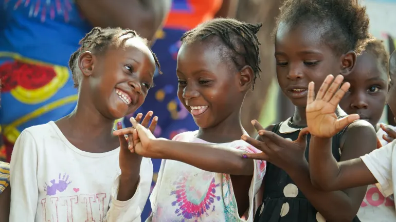 Children look at their fingers marked during the first round of the Polio Campaign, at the Jack Mwanapapa village in Livingstone, Zambia