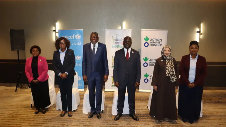Karen Sichinga, CEO of the Churches Health Association of Zambia; Director at the National Food and Nutrition Commission, Dr. Muntanga Mapani; Dr. Kennedy Lishimpi, Permanent Secretary for Technical Services at the Ministry of Health; Mr. Zachariah Luhanga, Permanent Secretary at the Ministry of Labour and Social Security; Dr. Saja Farooq Abdullah, UNICEF Representative; and Dr. Kakungu Simpungwe, Director of Public Health at the Ministry of Health. 