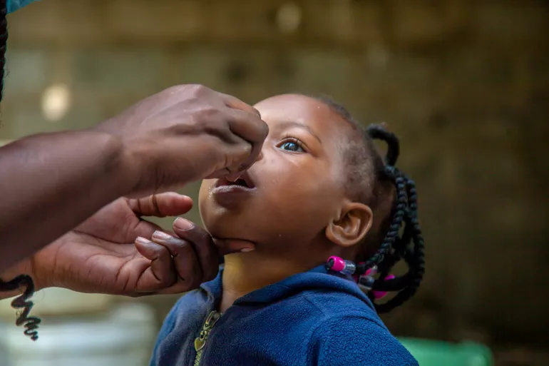 Child under 5 receiving vaccination in Lusaka, Zambia
