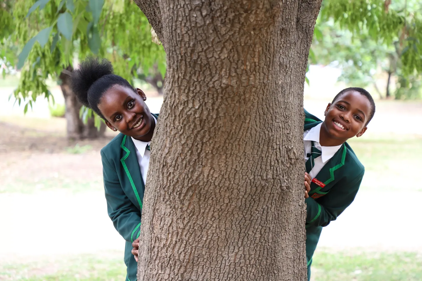 Children by a tree