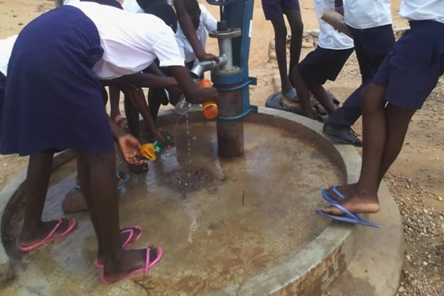 Students drinking water at the recently rehabilitated Siachilaba Secondary school in Binga