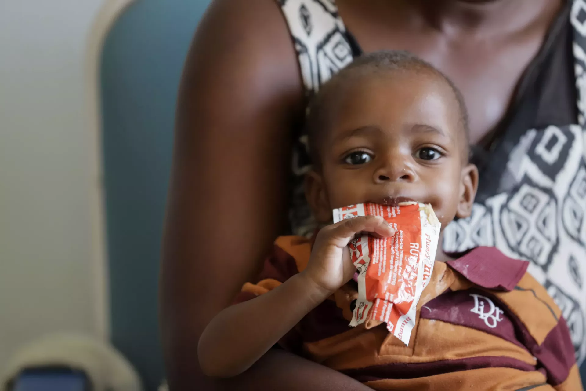 Child eating RUTF