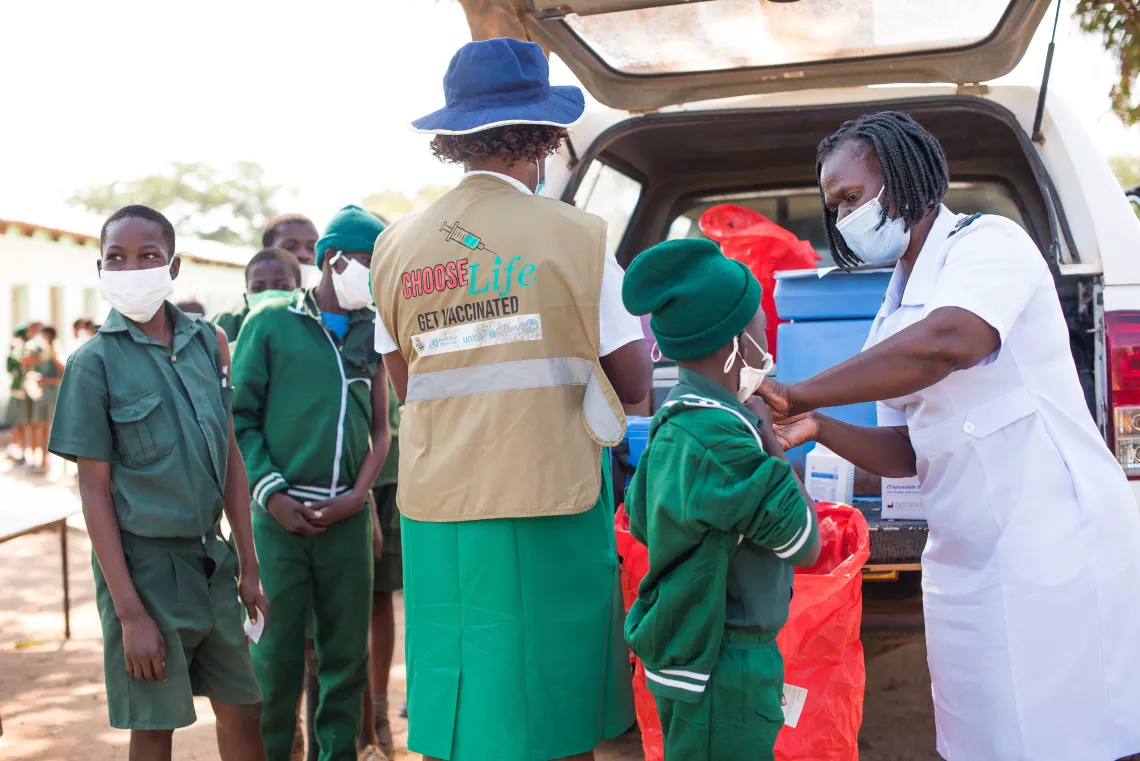 Children being vaccinated